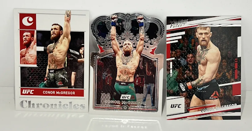 Sběratelské karty bojových sportů úvodní fotka produktu a karet UFC Chronicles